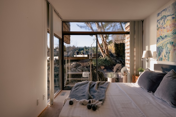 bedroom with transparent glass doors