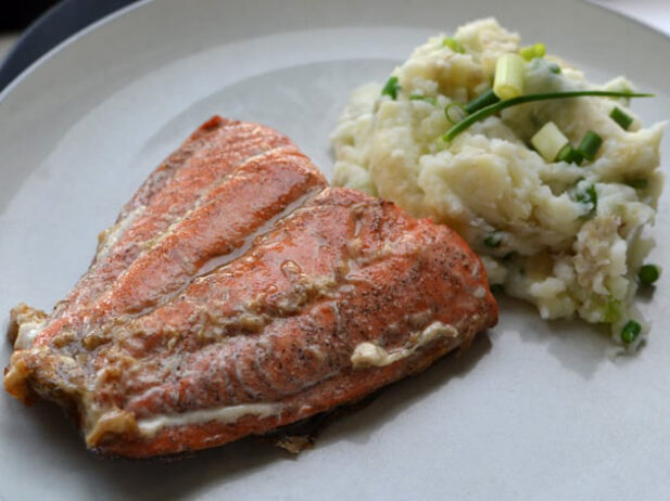 Maple-glazed Wild Sockeye Salmon with Mashed Potatoes and Garlic Scapes