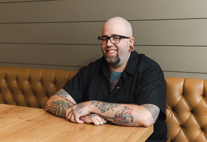Headshot of chef David Healey behind Victoria restaurants Birdman, Rudi and Wind Cries Mary