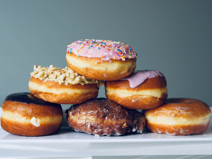 six donuts stacked like a pyramid 