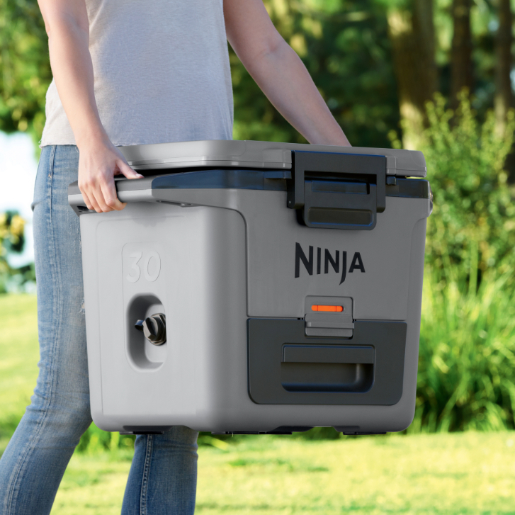 person holding a Ninja cooler
