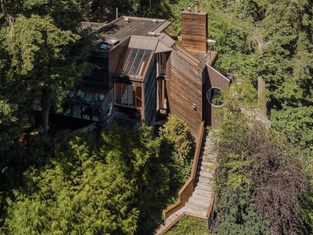 sea ranch house with green bushes around