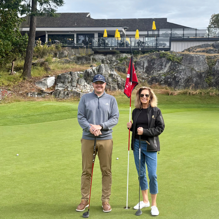 posing at the Fairwinds Golf Club with Travis Busch in Nanoose Bay