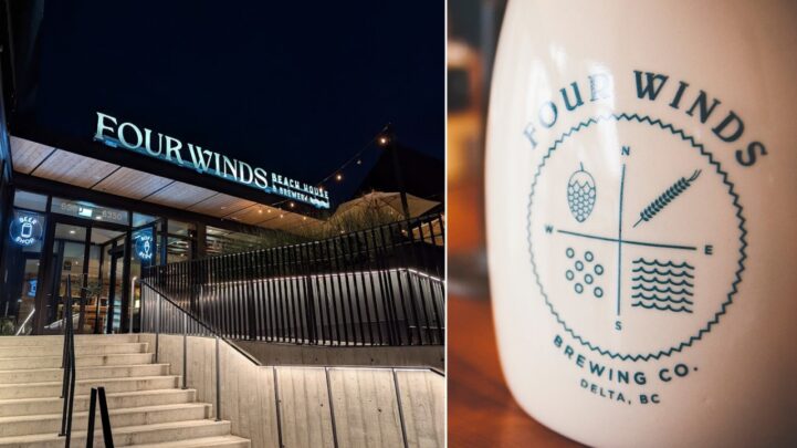 a lit building with a sign that says "Four Winds Beach House & Brewery ' on the front side of the roof and an image of a container that says 'Four Winds Brewing Co., Delta, BC'