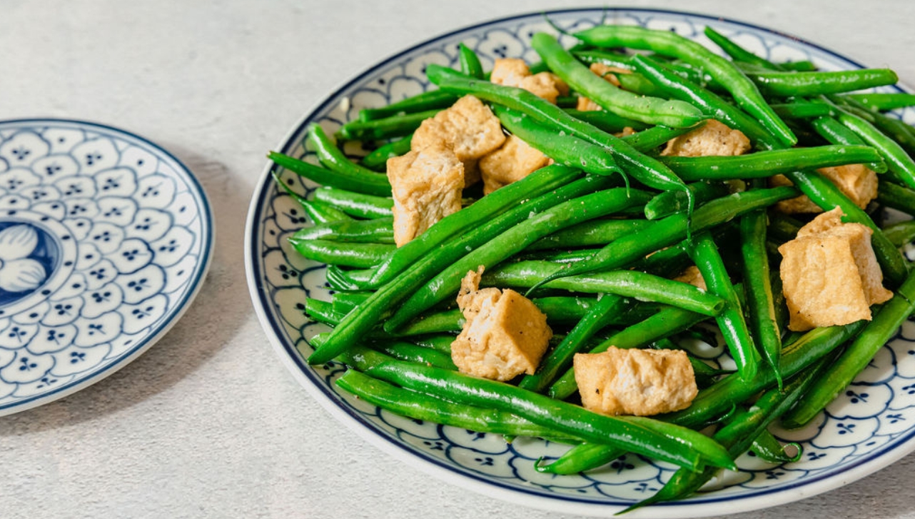 Anh and Chi Wok-fried Green Beans and Tofu on a plate