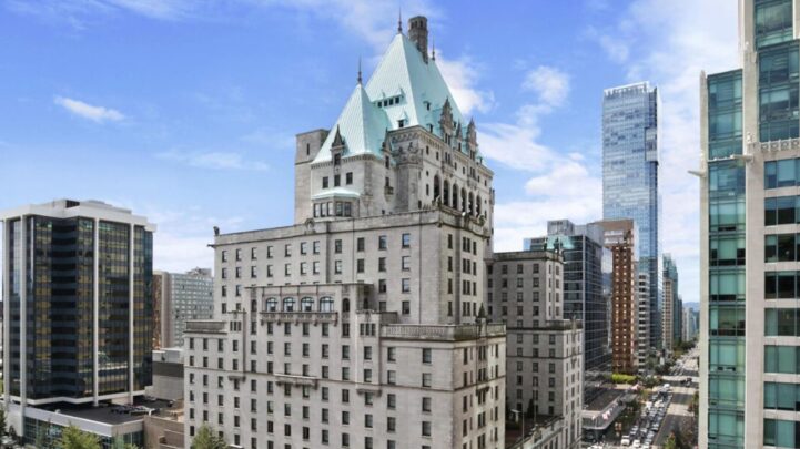 a huge and vast castle building - the fairmont hotel vancouver