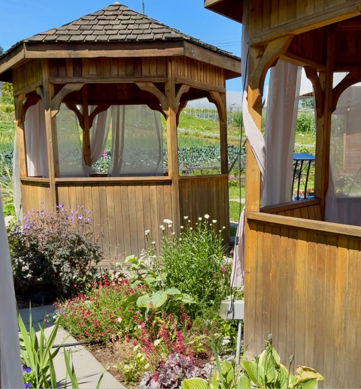 wooden gazebos at the Sunflower Cafe