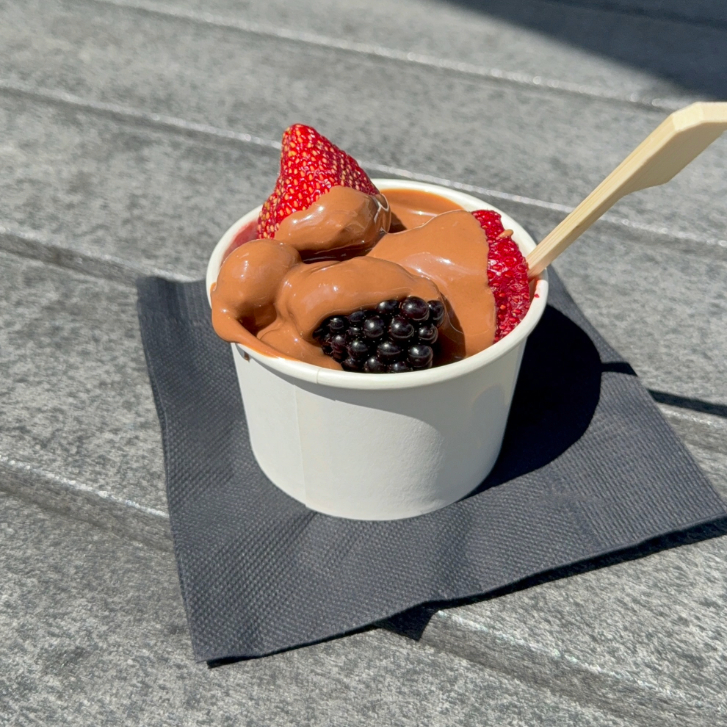 Melted milk chocolate over fresh berries from Hype Chocolate's pop up by the Fairmont Waterfront.