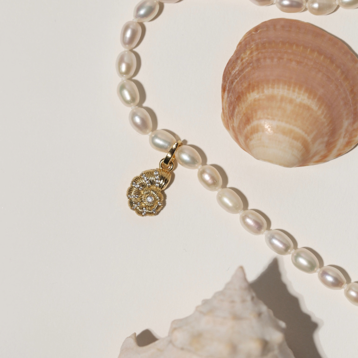 mermaid-core shell charm on pearl necklace from Melanie Auld