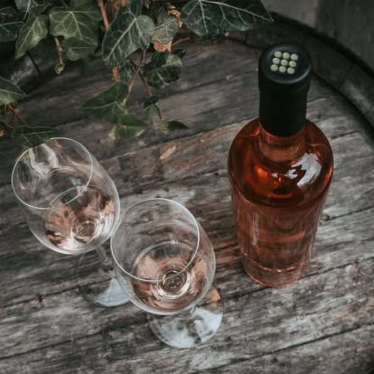 bottle of Laughing Stock Rosé and two glasses