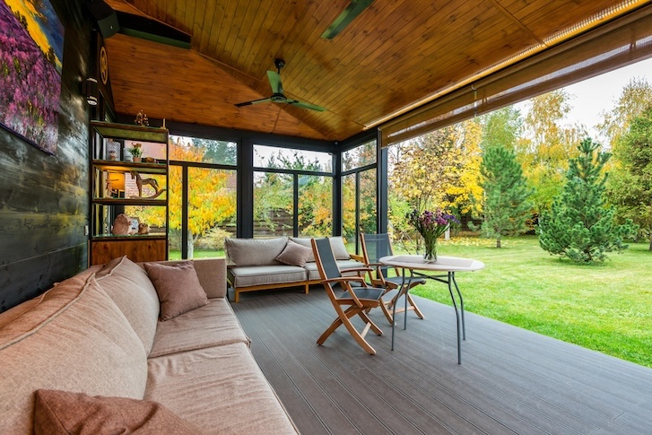 modular couches, chairs and tables on an open backyard space