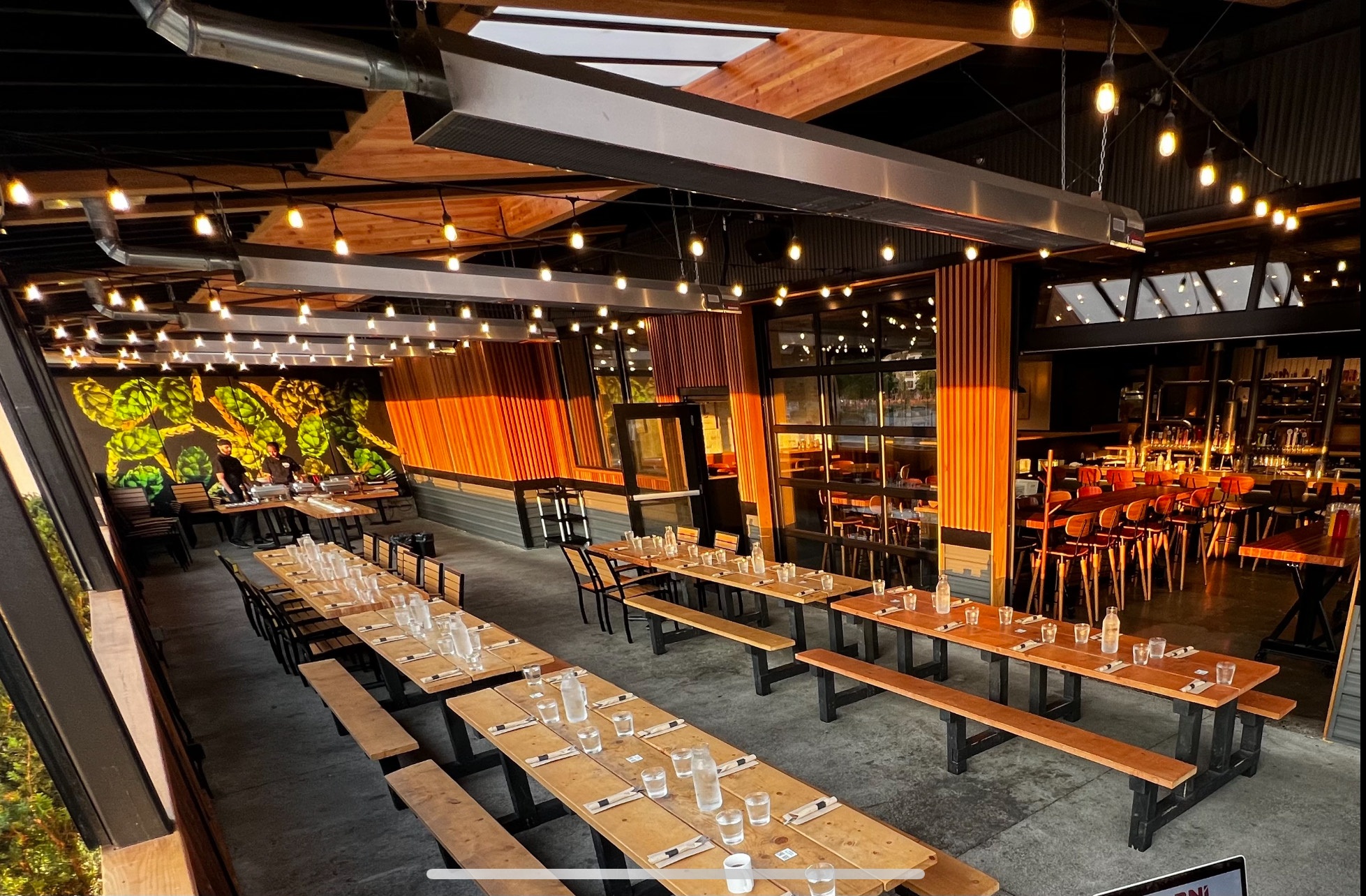 bright wooden dining room with empty tables set