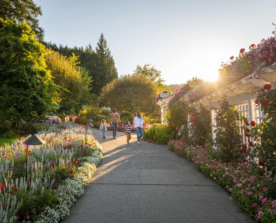 a family walking through the Butchart Gardens in Victoria