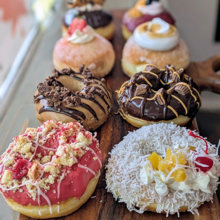an assortment of donuts from Yum Gourmet Donuts