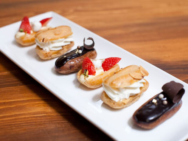 Chinese Five-Spice Crusted Éclairs with Vanilla Pastry Cream & Seasonal Berries