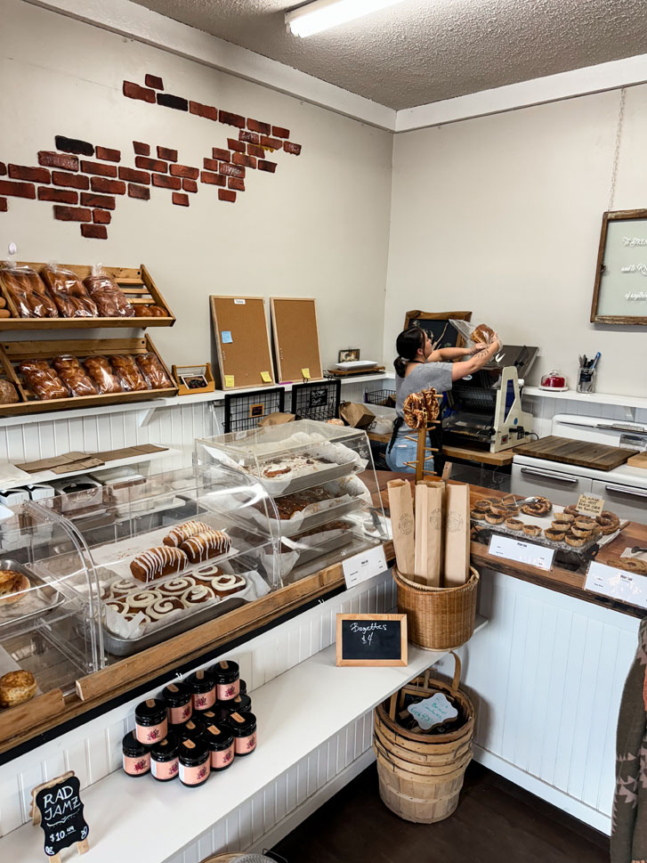 aerial view of a shop's counter covered with sugary desserts of various kinds