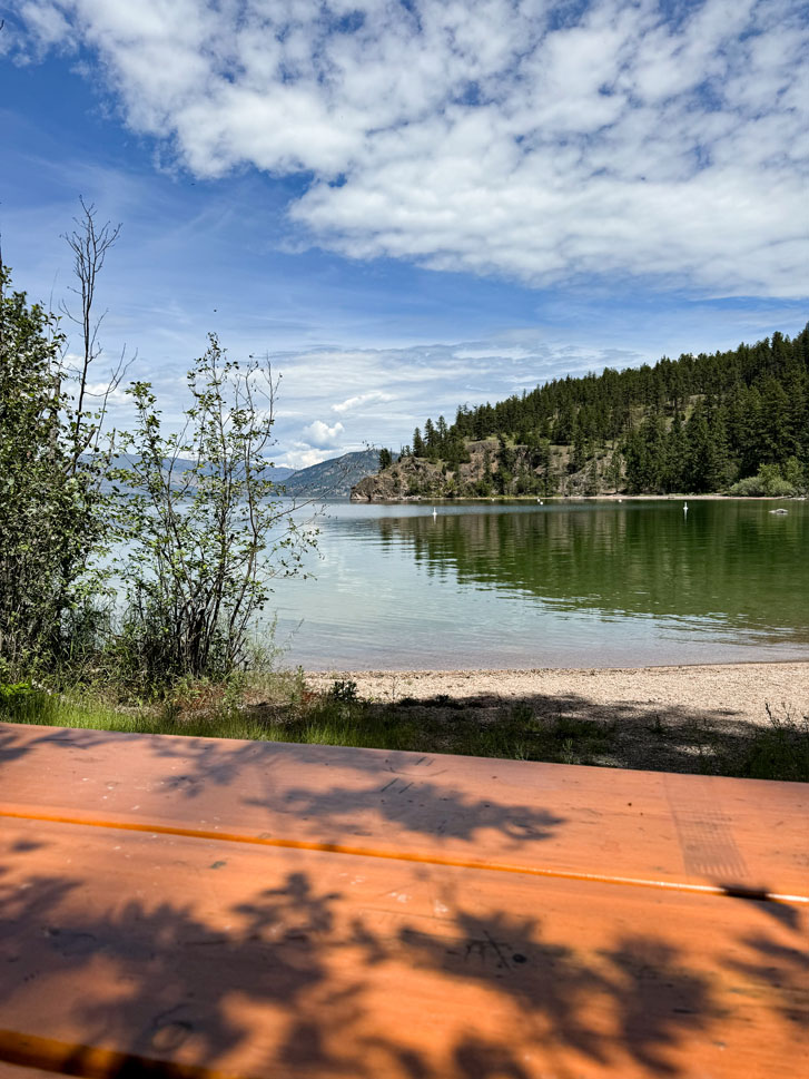 a huge lake beside the hills