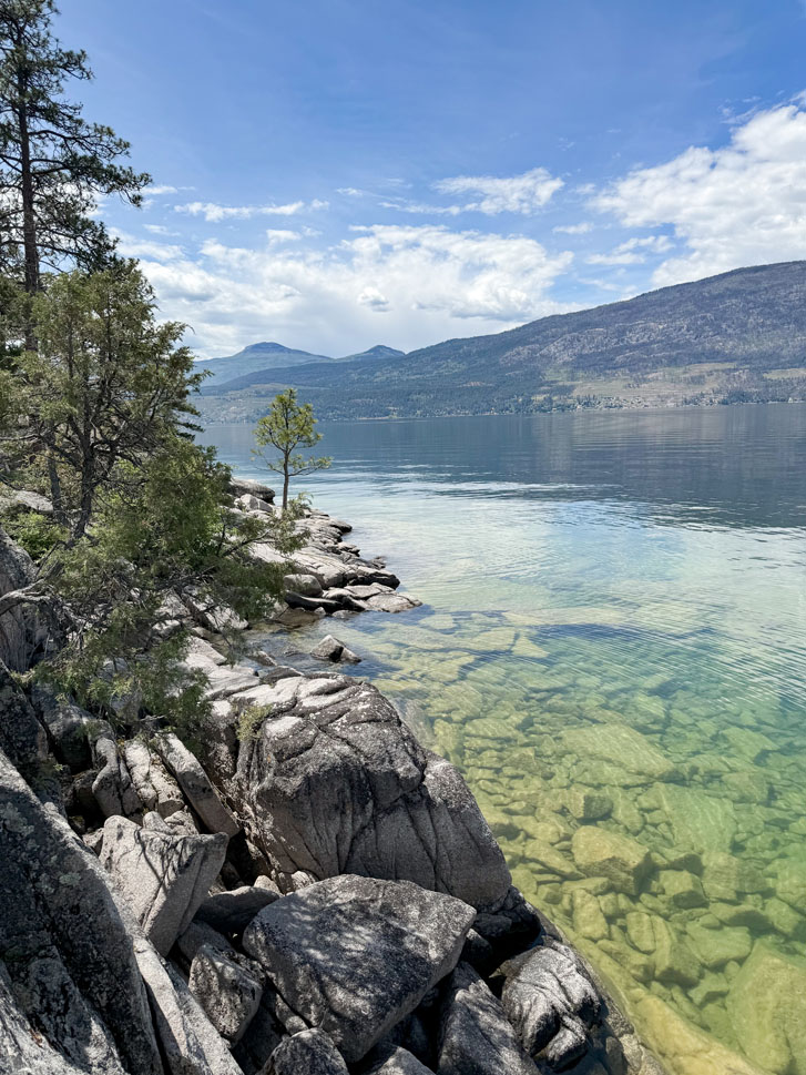 rocky area beside a huge lake