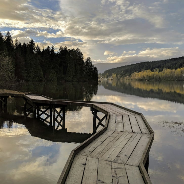 gray-wooden-dock-on-lake-during-daytime hike near Vancouver